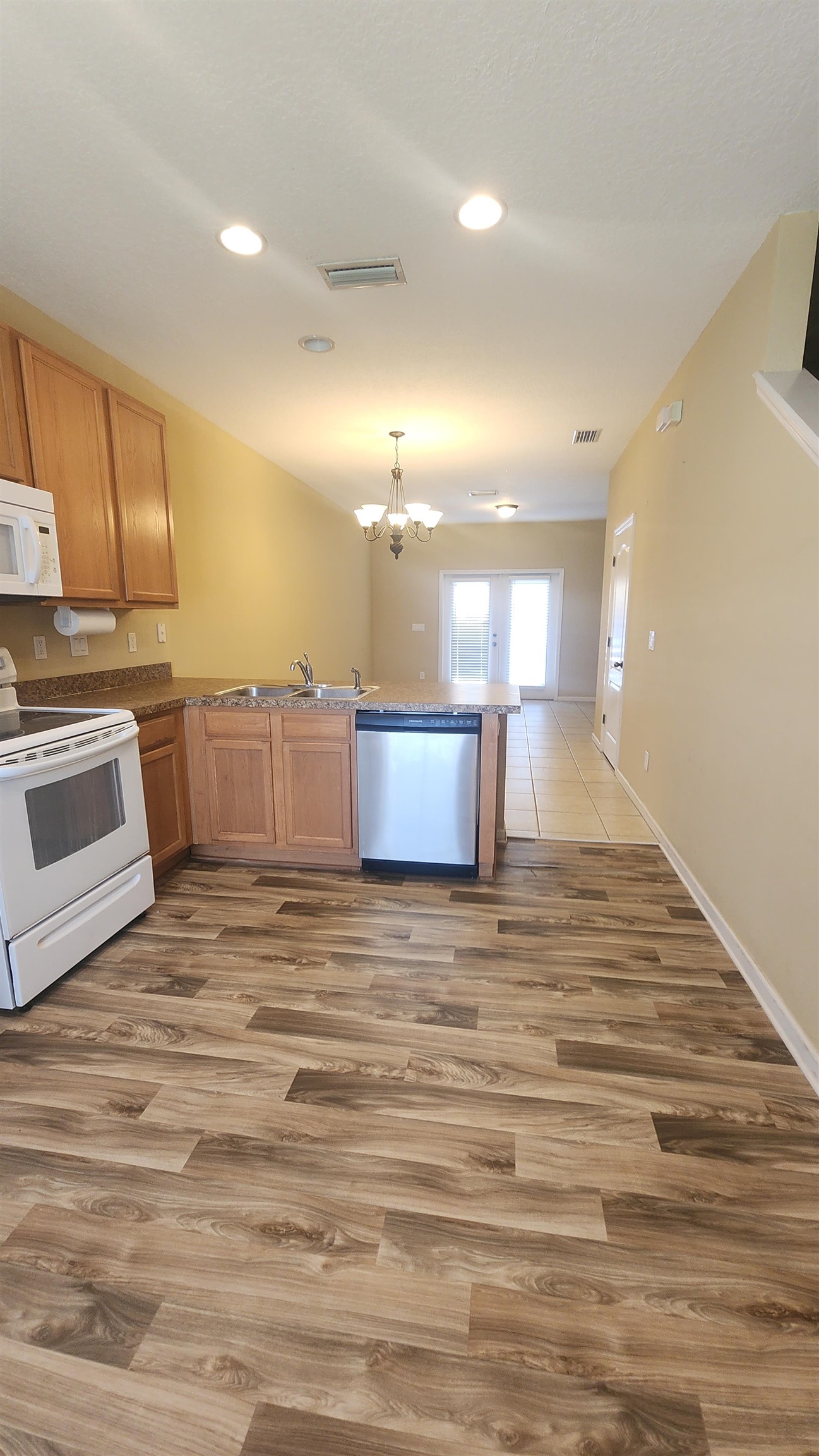 430 Cabernet Place St. Augustine, FL 32084 - Photo 3 of 19 a view of a kitchen with a stove and cabinets