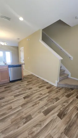 a view of a kitchen with a sink cabinets and a window