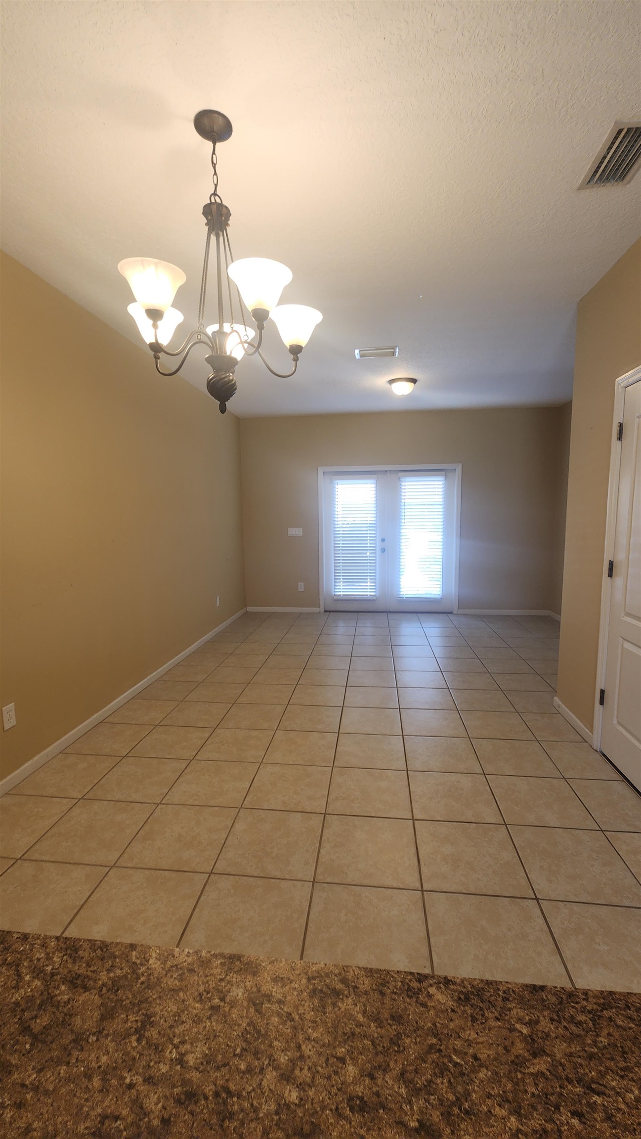 430 Cabernet Place St. Augustine, FL 32084 - Photo 6 of 19 a view of wooden floor and windows in a room
