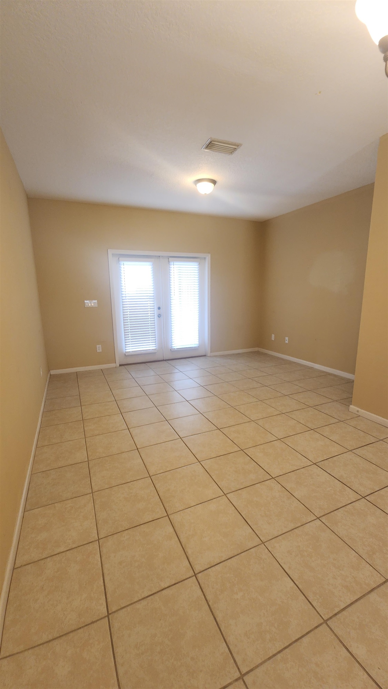 430 Cabernet Place St. Augustine, FL 32084 - Photo 7 of 19 a view of an empty room and window