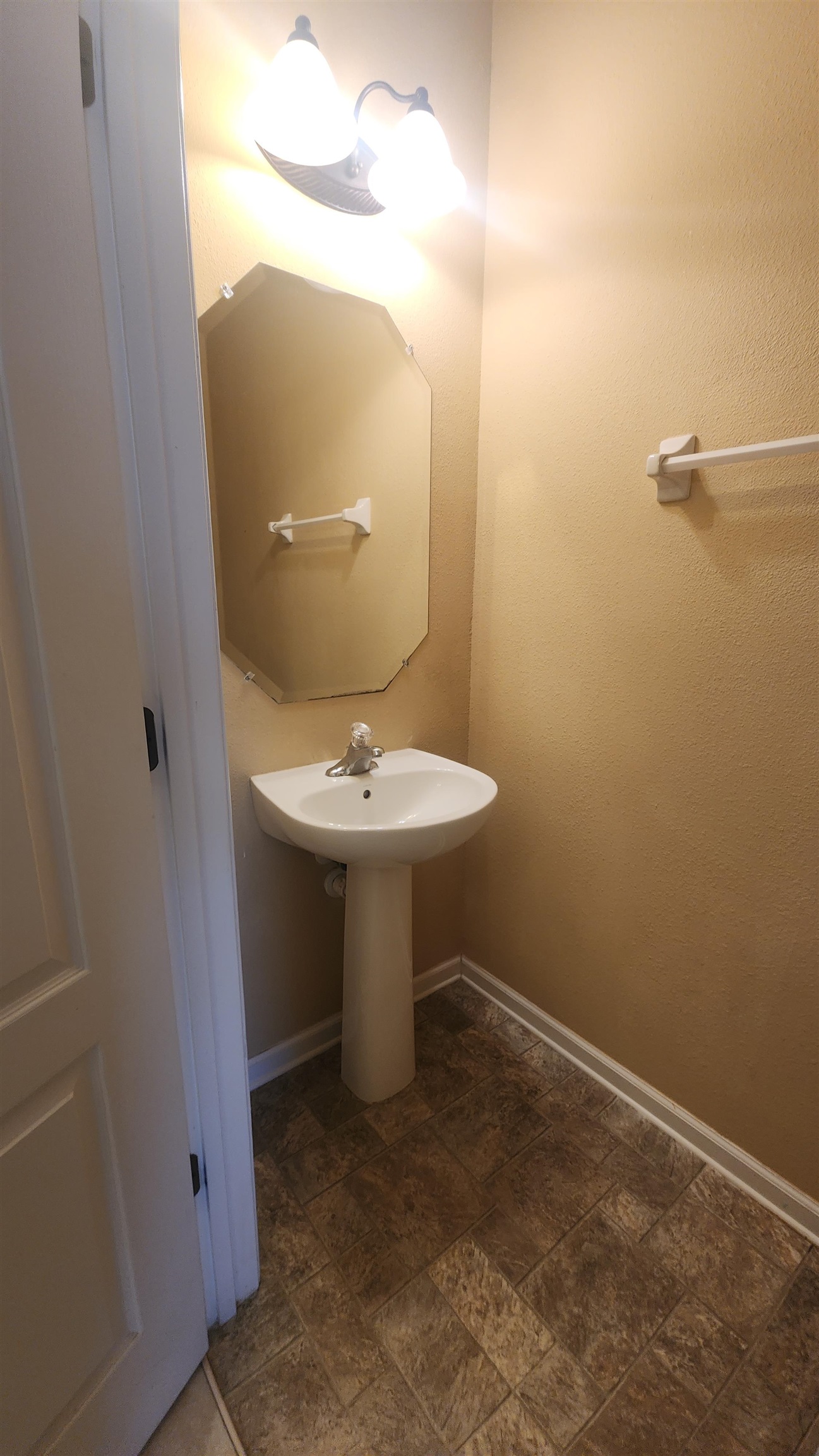 430 Cabernet Place St. Augustine, FL 32084 - Photo 8 of 19 a bathroom with a sink and mirror