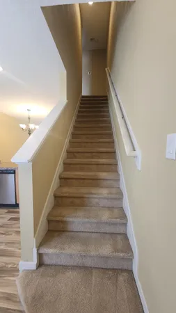 a view of hallway with windows