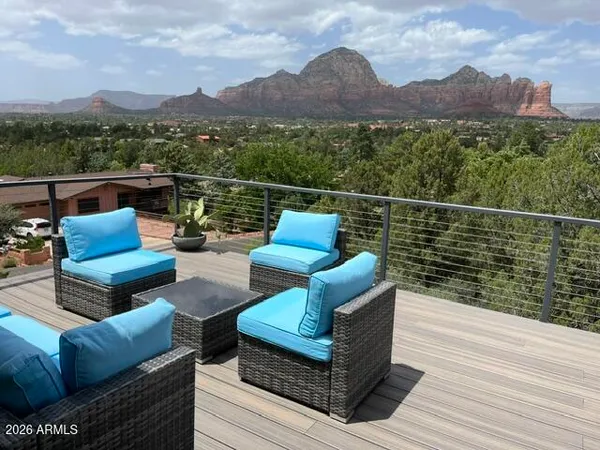 a view of a terrace with couches