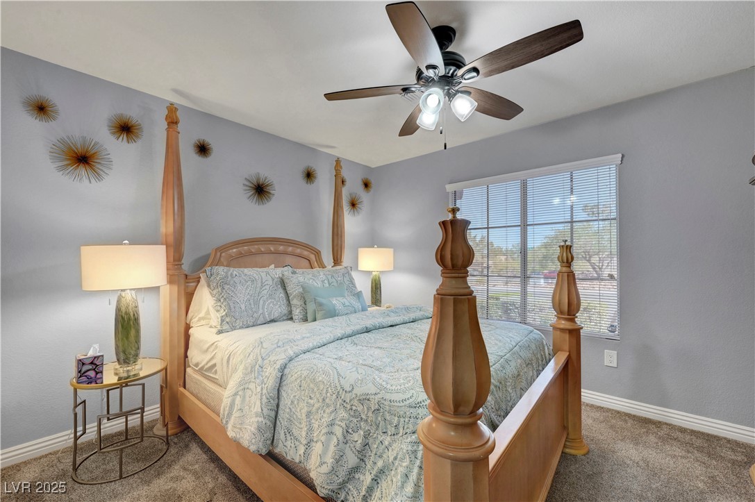 Undisclosed Address Las Vegas, NV 89134 - Photo 18 of 39 Bedroom featuring ceiling fan and carpet flooring