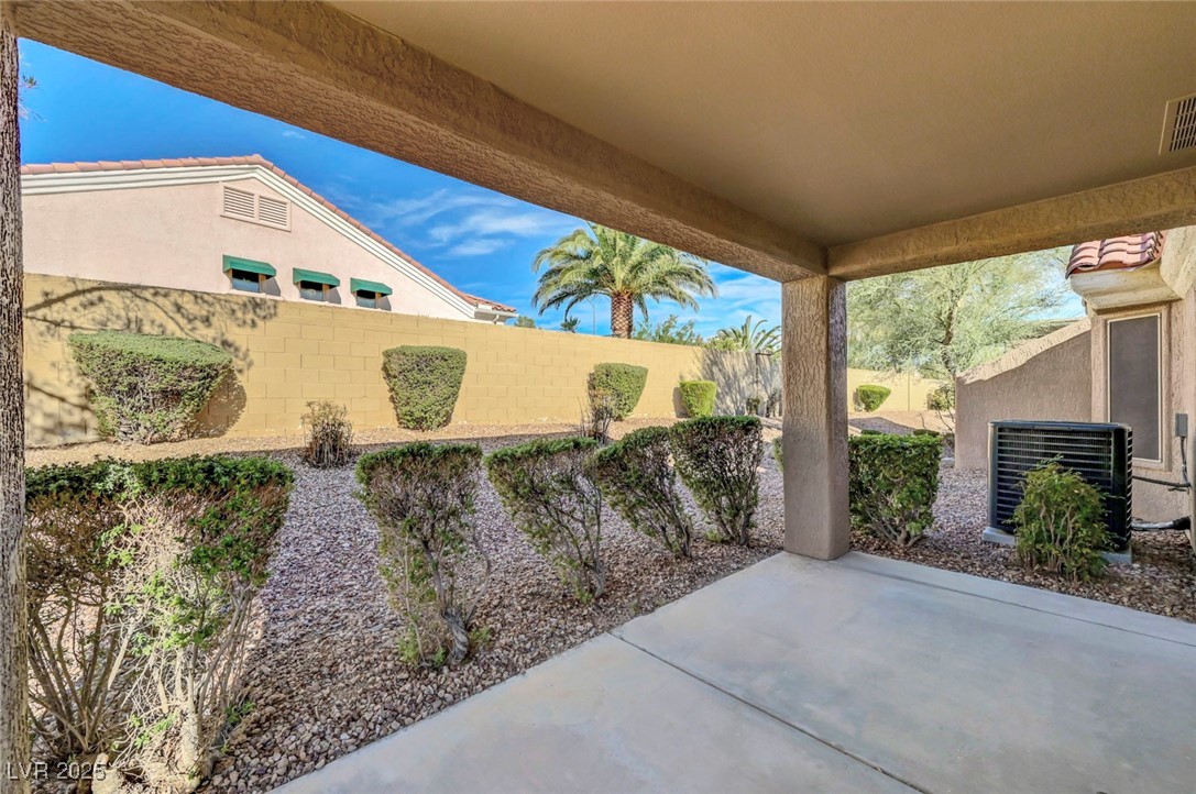 Undisclosed Address Las Vegas, NV 89134 - Photo 36 of 39 Fenced backyard featuring a patio area