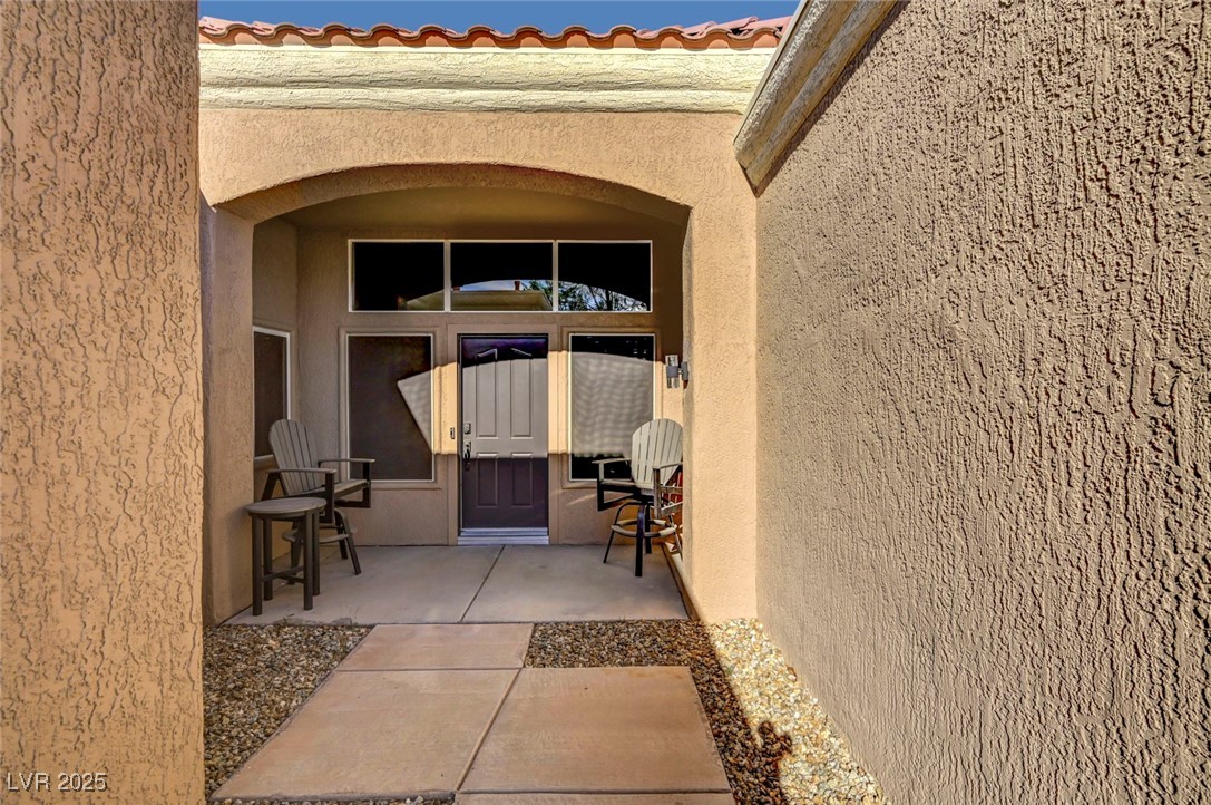 Undisclosed Address Las Vegas, NV 89134 - Photo 37 of 39 Property entrance with stucco siding