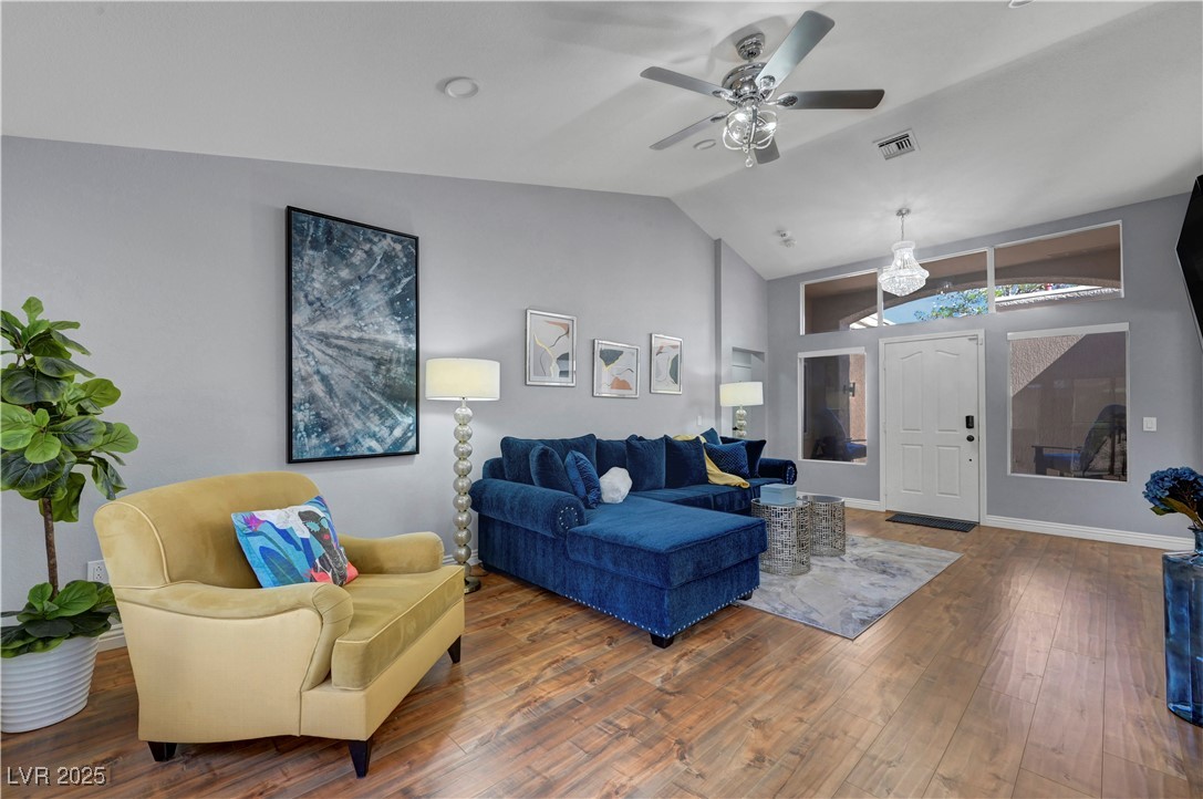 Undisclosed Address Las Vegas, NV 89134 - Photo 7 of 39 Living room featuring hardwood / wood-style flooring, ceiling fan, and high vaulted ceiling
