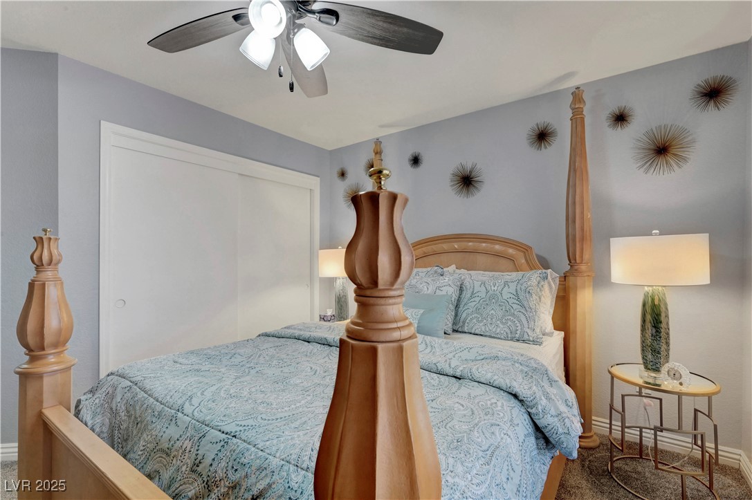 Undisclosed Address Las Vegas, NV 89134 - Photo 9 of 39 Carpeted bedroom with a ceiling fan and a closet