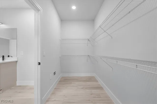 a view of a room with white walls