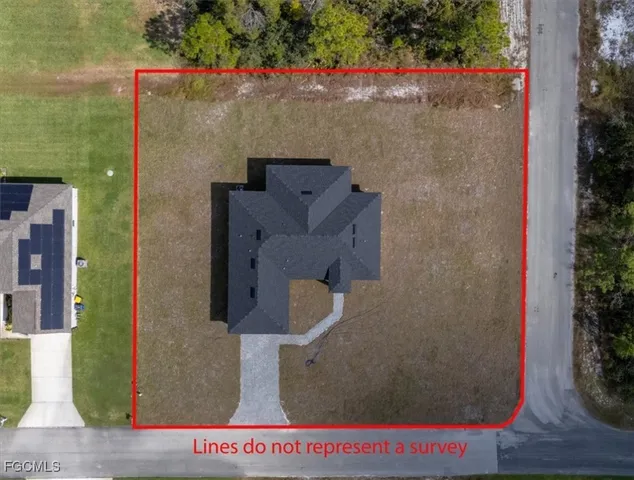 an aerial view of houses and roads