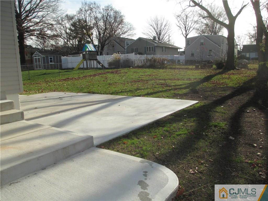 77 Middle Hill Road Colonia, NJ 07067 - Photo 14 of 21 a view of a backyard