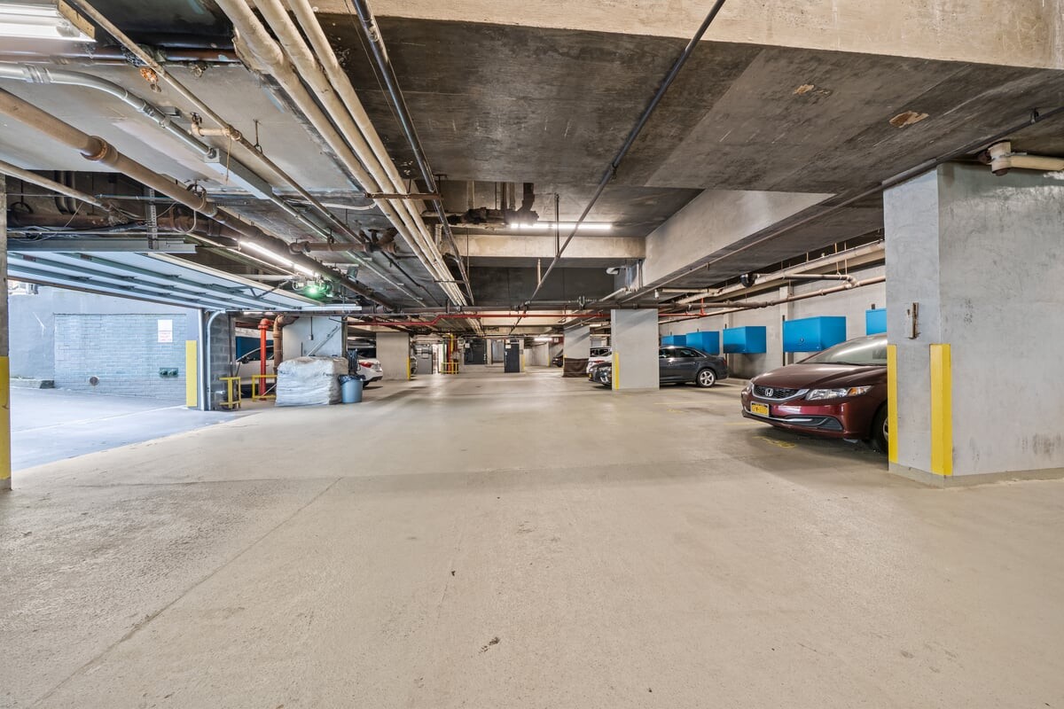 2400 Johnson Avenue, Unit 2F Bronx, NY 10463 - Photo 23 of 25 a view of parking garage with cars