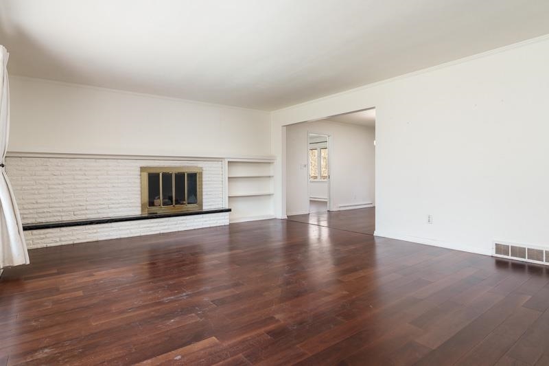 2309 Harris Road Rockford, IL 61107 - Photo 12 of 42 a view of empty room with wooden floor