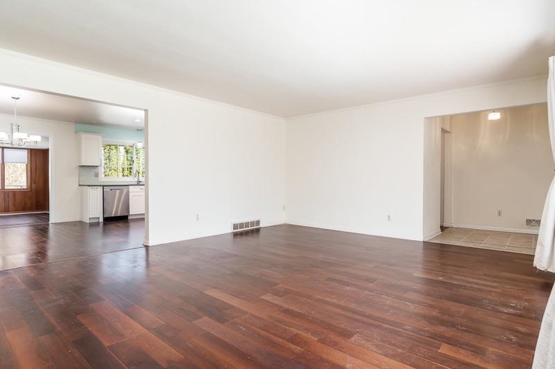 2309 Harris Road Rockford, IL 61107 - Photo 16 of 42 an empty room with wooden floor and natural light