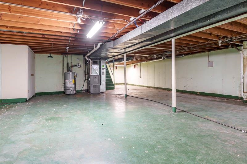 2309 Harris Road Rockford, IL 61107 - Photo 40 of 42 a view of a room with wooden walls