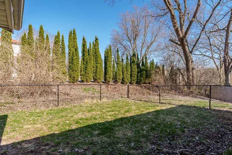 2309 Harris Road Rockford, IL 61107 - Photo 10 of 42 a swimming pool with outdoor seating and yard