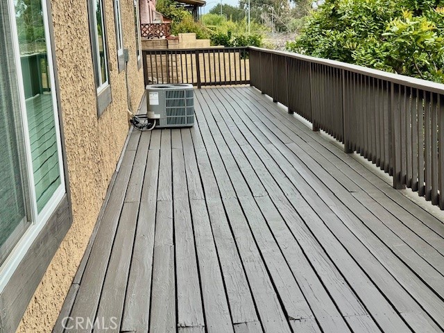 18336 Algiers Street Porter Ranch, CA 91326 - Photo 16 of 18 a balcony with wooden floor