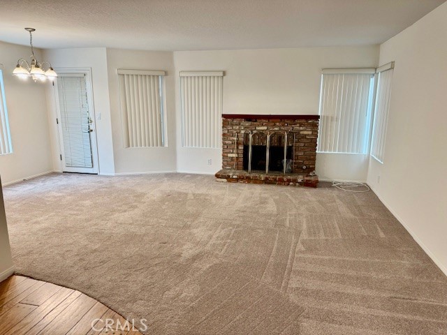 18336 Algiers Street Porter Ranch, CA 91326 - Photo 3 of 18 a view of an empty room with a fireplace