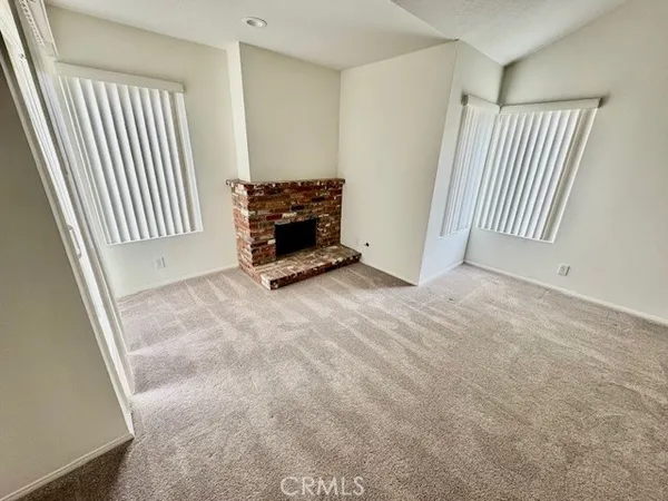 a view of a livingroom with a fireplace