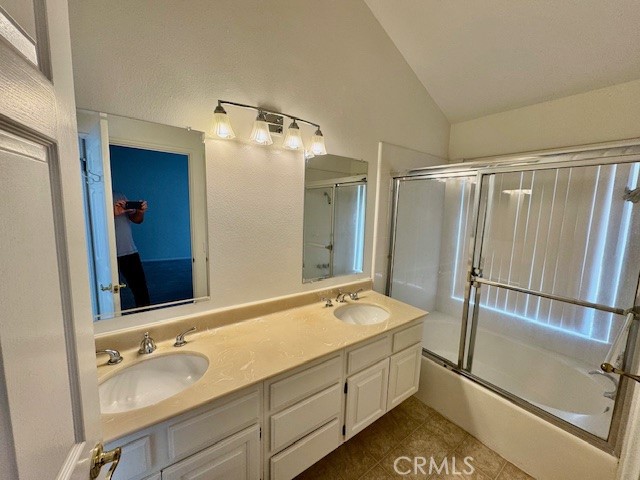 18336 Algiers Street Porter Ranch, CA 91326 - Photo 9 of 18 a bathroom with a tub sink and mirror