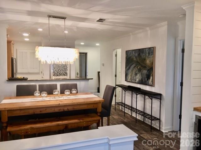 646 Portside Drive Davidson, NC 28036 - Photo 14 of 48 a dining room with furniture and a window