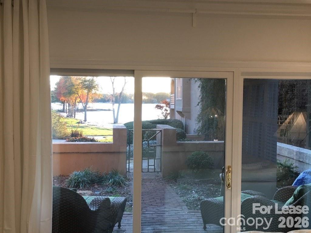 646 Portside Drive Davidson, NC 28036 - Photo 22 of 48 a view of a glass door of the house