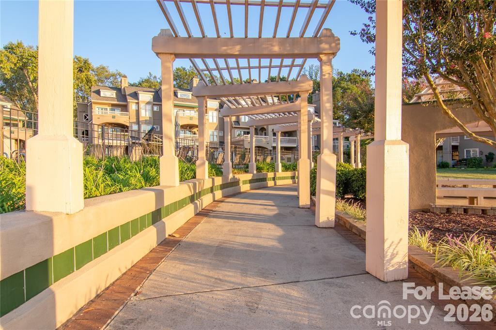 646 Portside Drive Davidson, NC 28036 - Photo 26 of 48 a view of a large building with a balcony