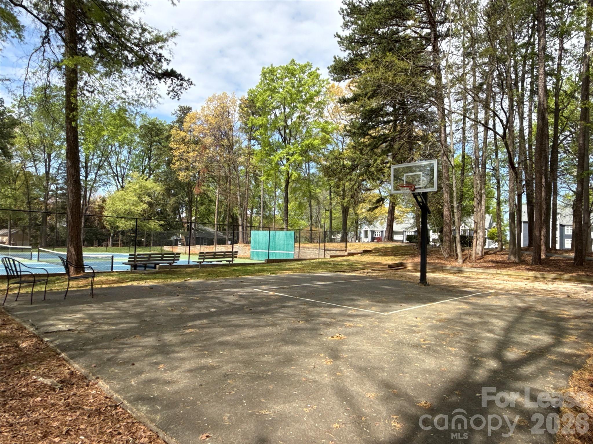 646 Portside Drive Davidson, NC 28036 - Photo 35 of 48 a view of a playground with basketball court