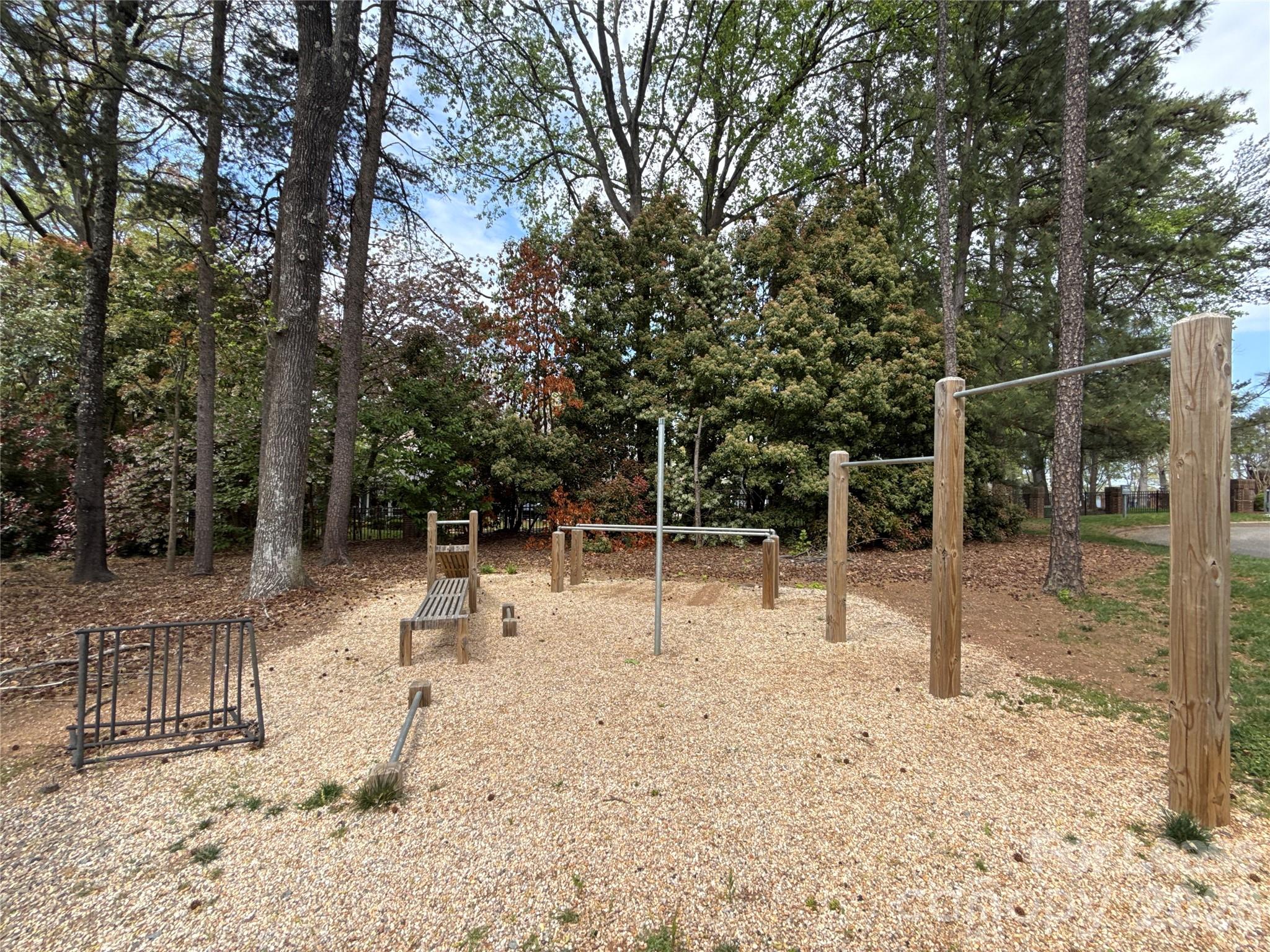 646 Portside Drive Davidson, NC 28036 - Photo 37 of 48 a backyard of a house with table and chairs