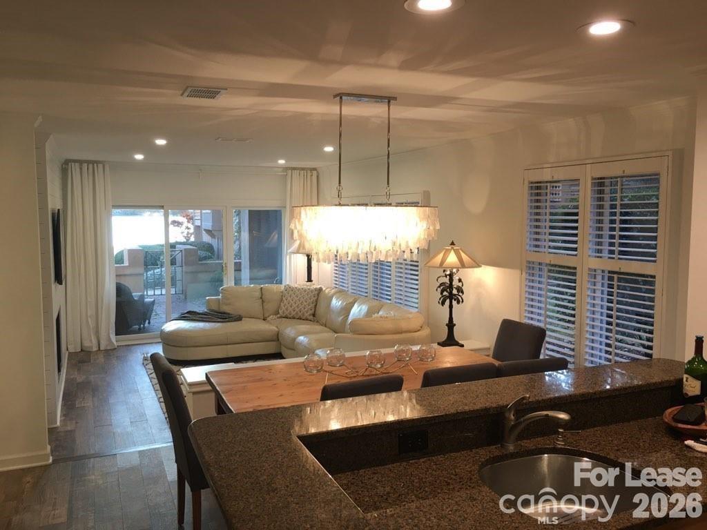 646 Portside Drive Davidson, NC 28036 - Photo 5 of 48 a living room with furniture and a large window