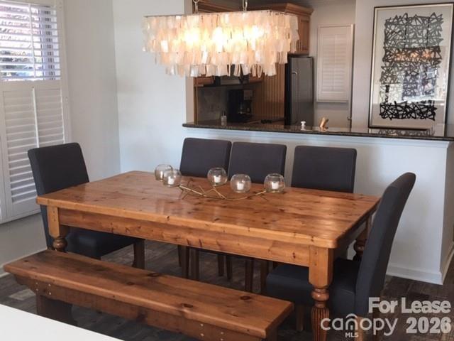 646 Portside Drive Davidson, NC 28036 - Photo 6 of 48 a view of a dining room with furniture and window