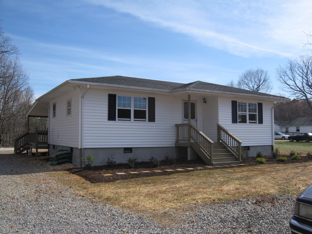 1048 Deep Woods Road Hardy, VA 24101 - Photo 2 of 17 a view of a house with backyard and garage