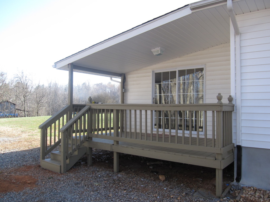 1048 Deep Woods Road Hardy, VA 24101 - Photo 8 of 17 a view of a wooden deck and a yard