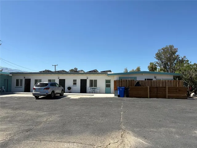 a view of a car in front of house