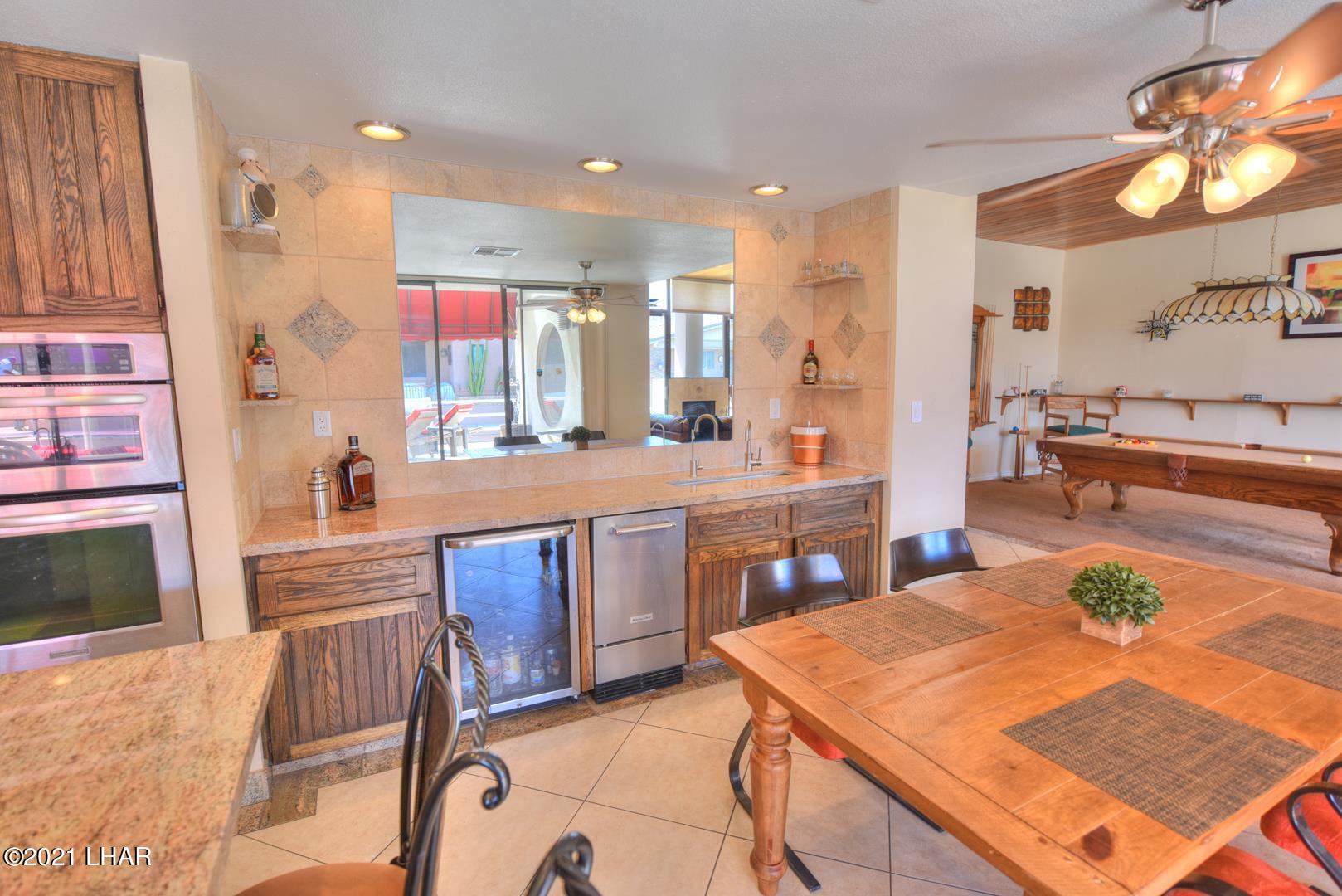 8887 Apache Loop Parker, AZ 85344 - Photo 21 of 39 BAR WITH ICE MAKER!!