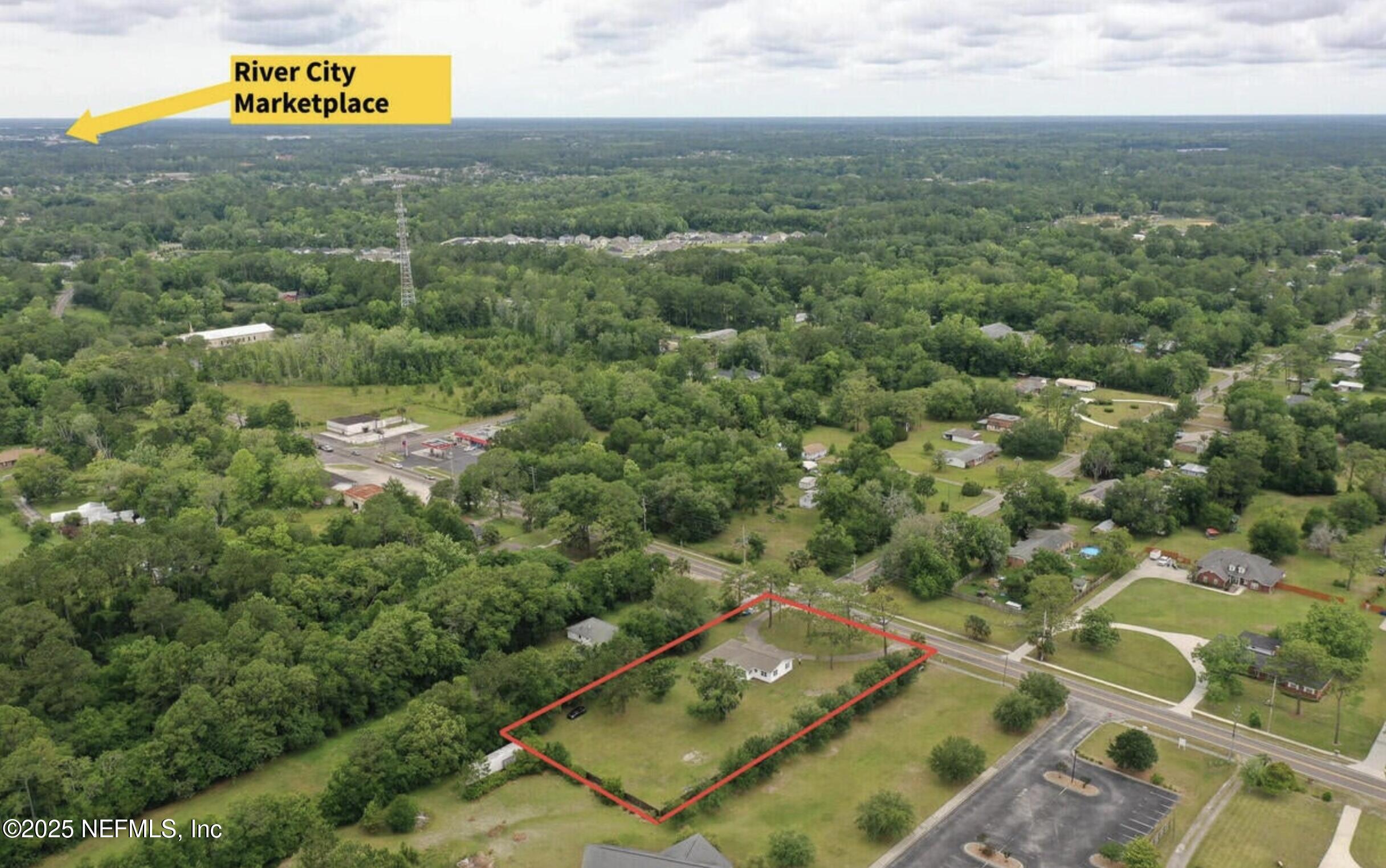 2604 New Berlin Road Jacksonville, FL 32226 - Photo 5 of 6 an aerial view of residential houses with outdoor space and swimming pool