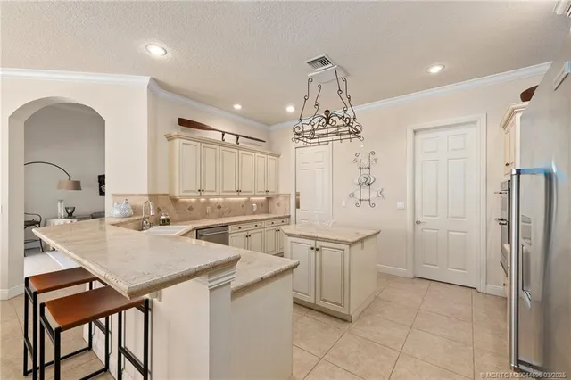 $1,069,000 | 3169 Southwest Bicopa Place, Palm City, FL 34990