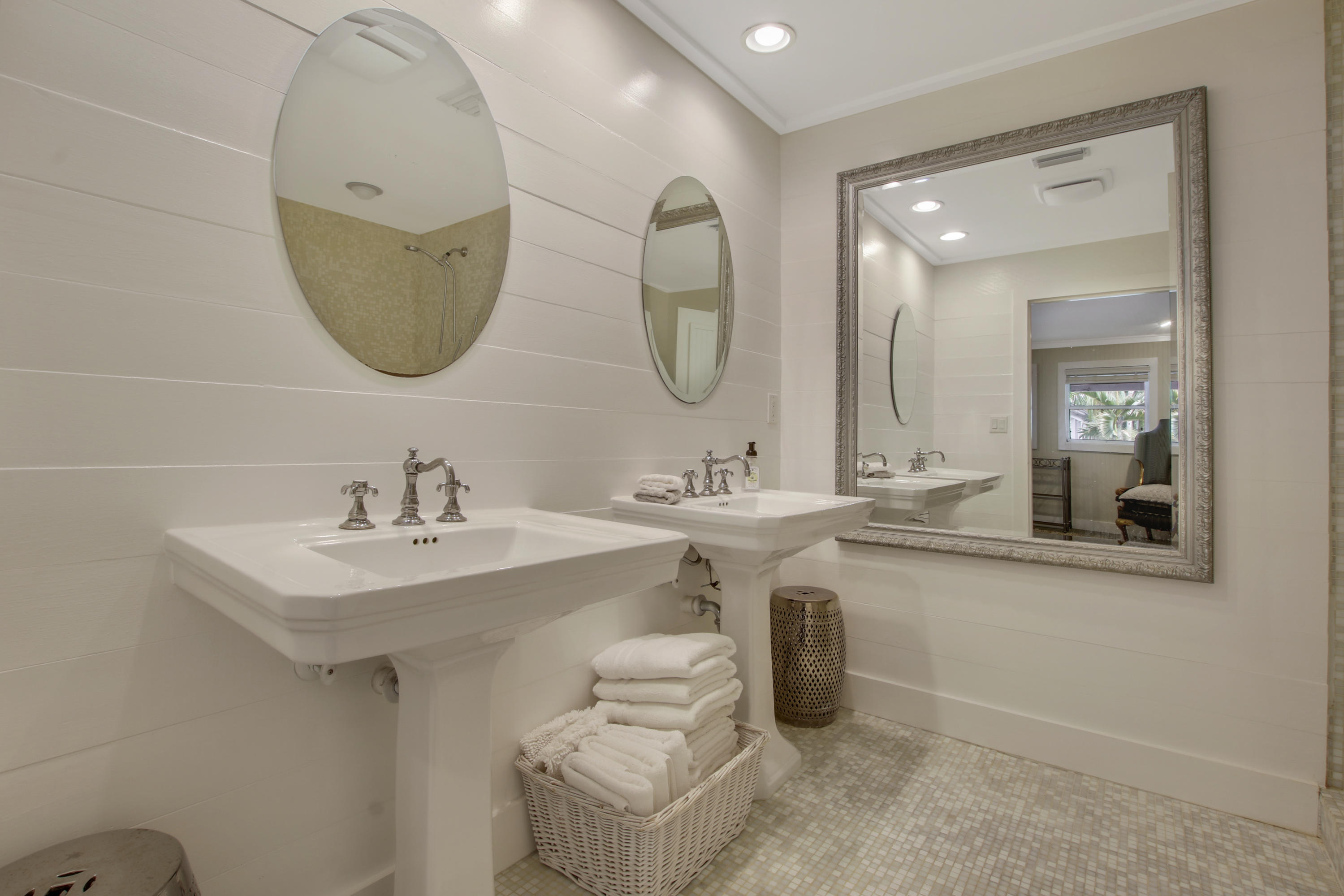 18600 Southeast Mack Dairy Road Jupiter, FL 33478 - Photo 21 of 36 a bathroom with a double vanity sink and a mirror