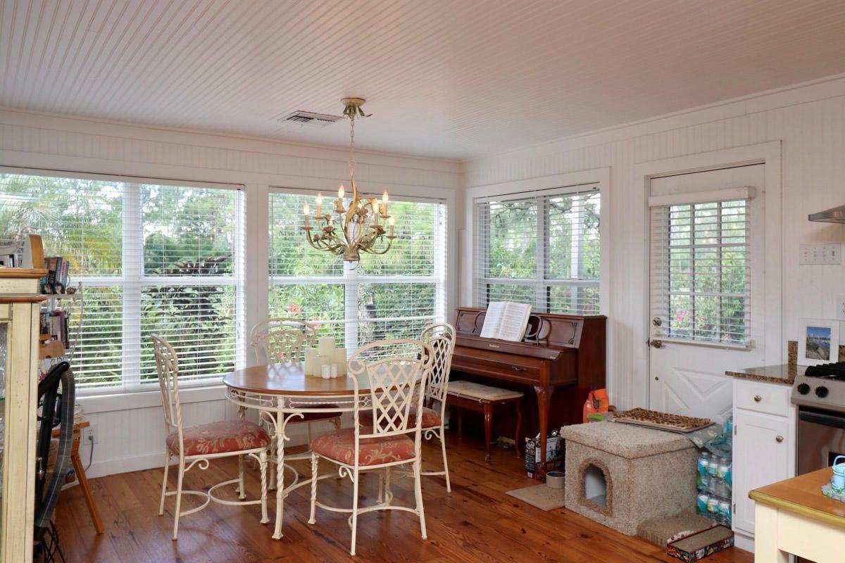 18600 Southeast Mack Dairy Road Jupiter, FL 33478 - Photo 36 of 36 a view of a workspace with furniture and a window