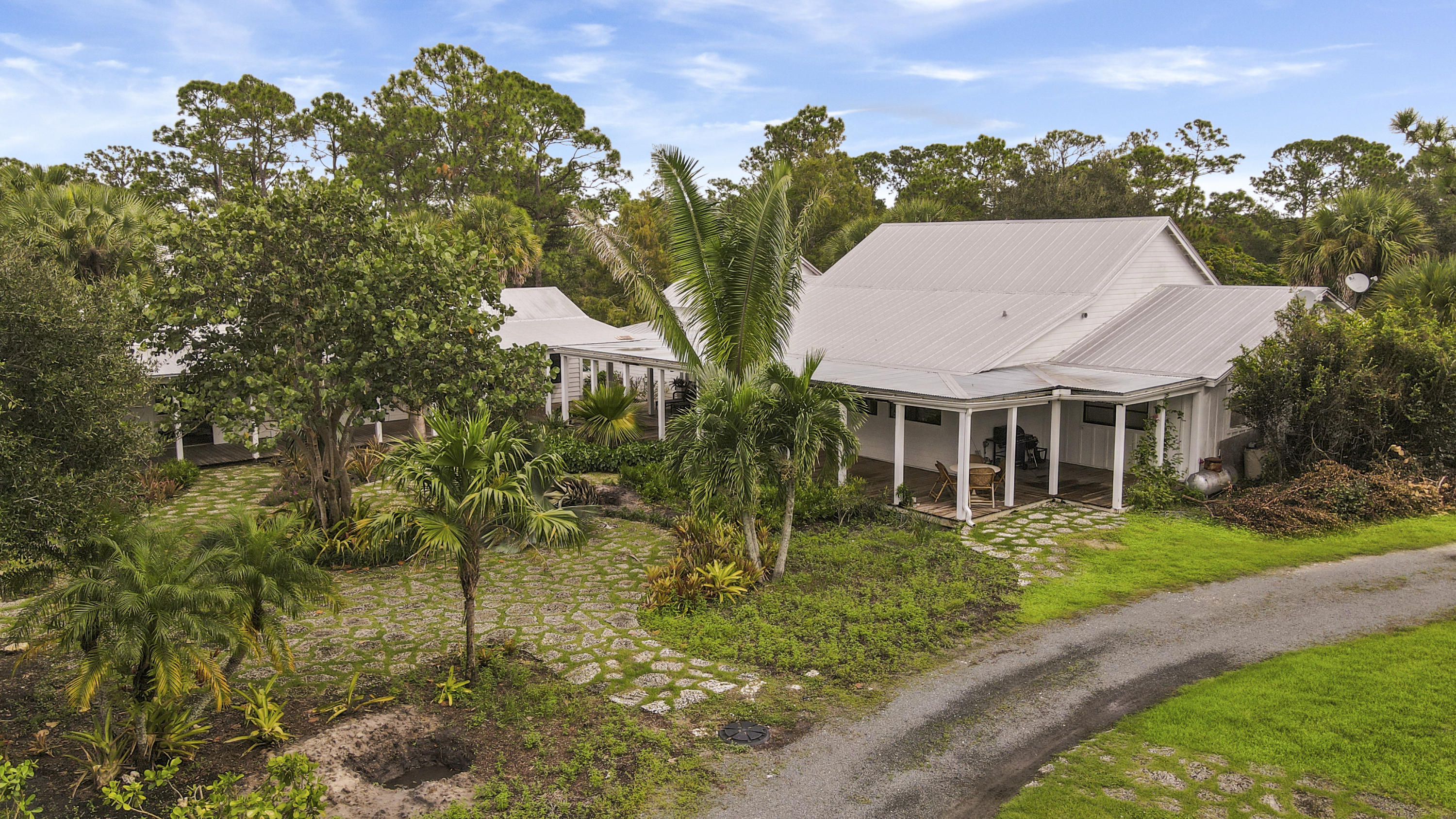 18600 Southeast Mack Dairy Road Jupiter, FL 33478 - Photo 4 of 36 a aerial view of a house