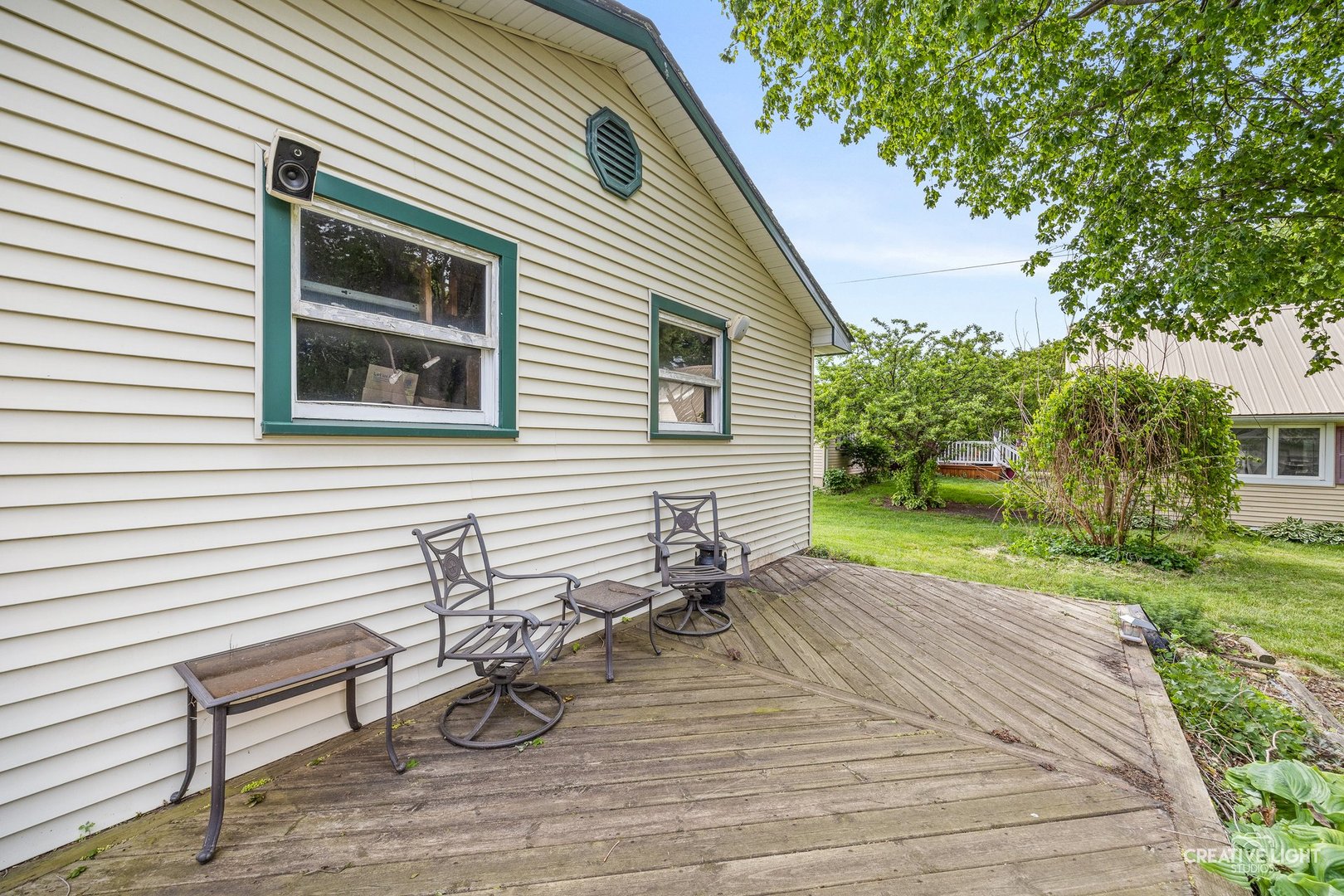 209 North Shabbona Road Shabbona, IL 60550 - Photo 19 of 25 a view of a house with backyard and sitting area