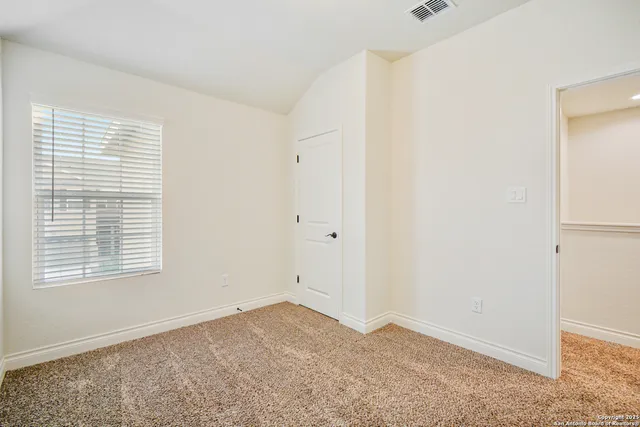 a view of empty room with window