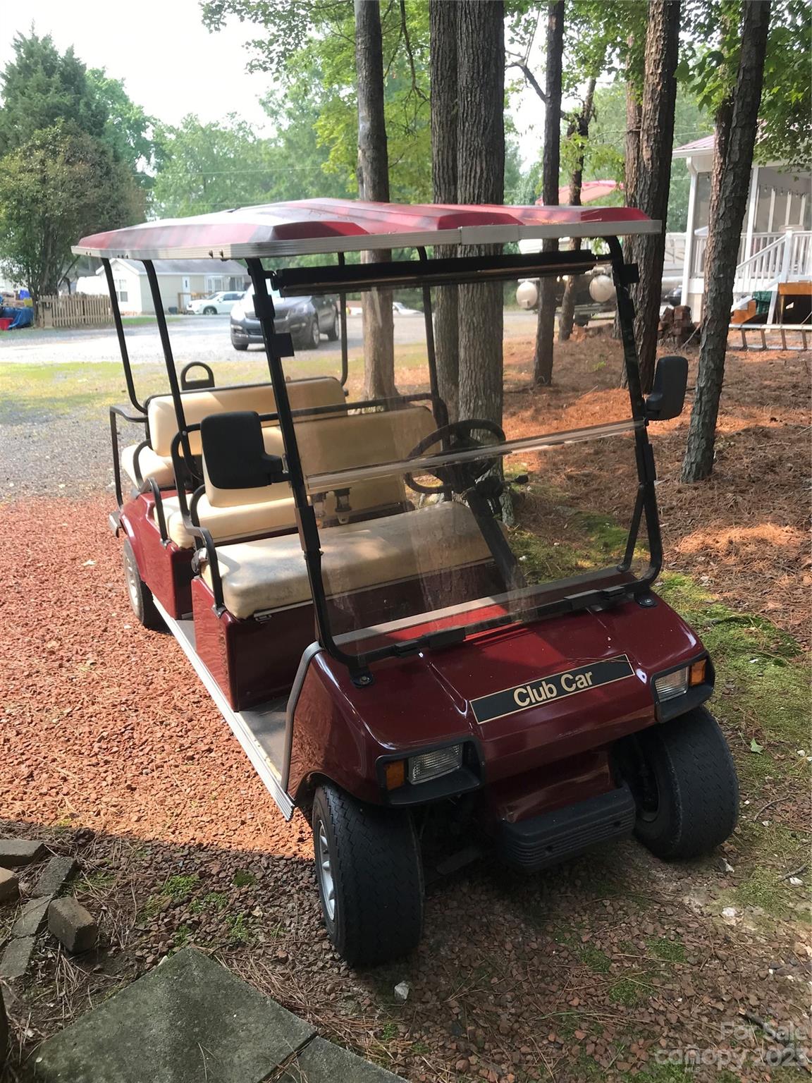 154 Roberts Ridge Road Mount Gilead, NC 27306 - Photo 34 of 35 a view of a patio with table and chairs with wooden floor and fence