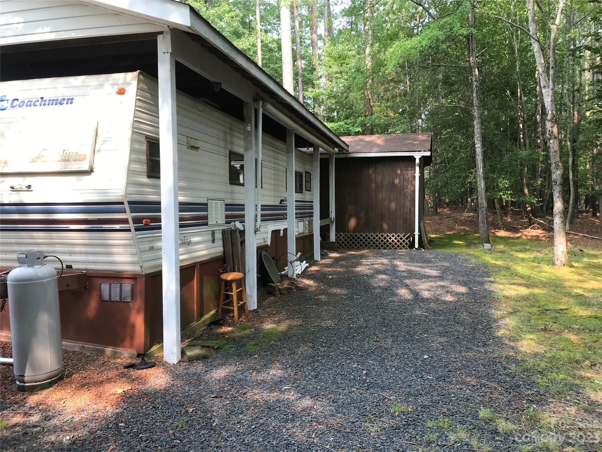 154 Roberts Ridge Road Mount Gilead, NC 27306 - Photo 4 of 35 a view of backyard with tub