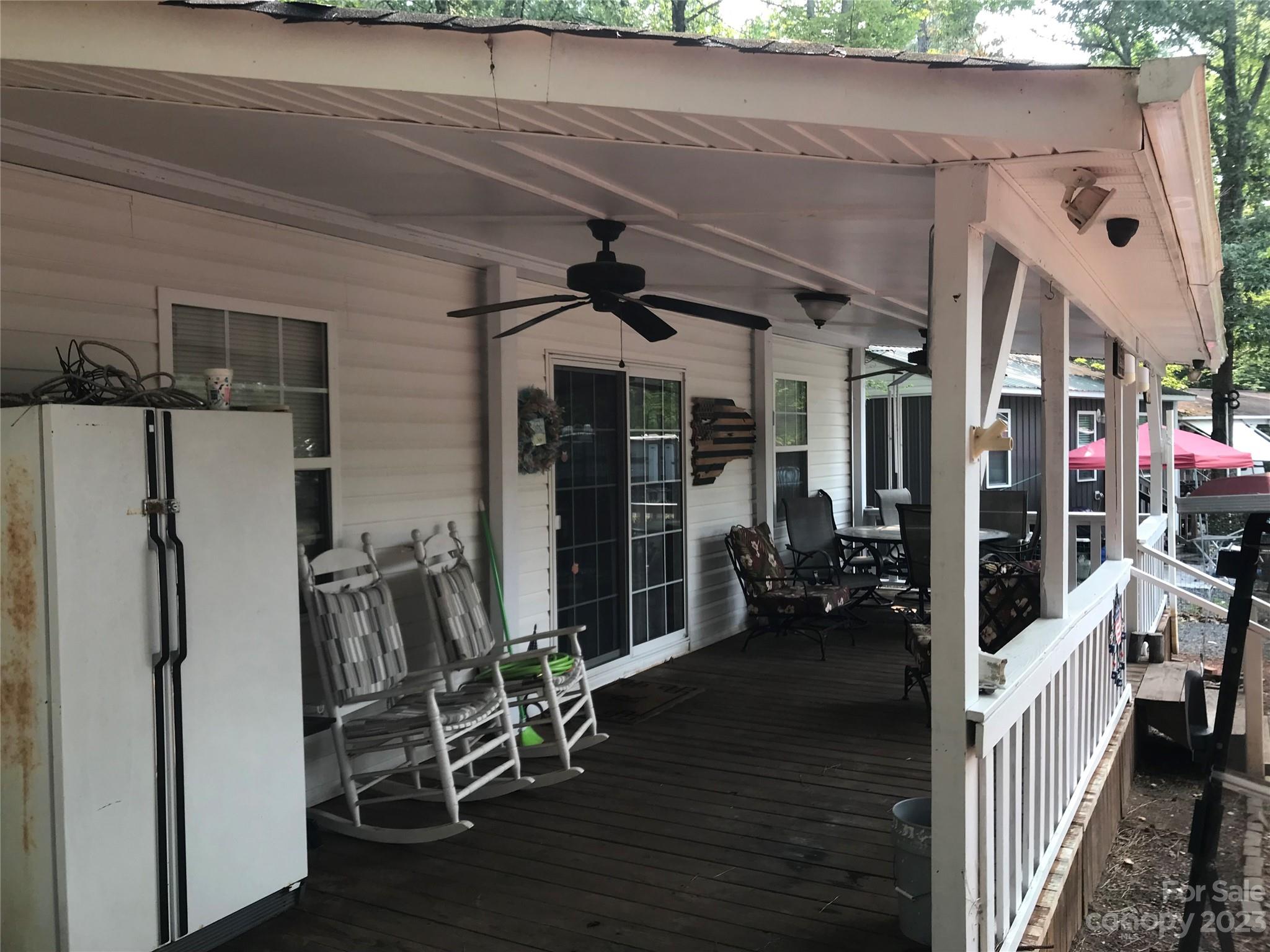 154 Roberts Ridge Road Mount Gilead, NC 27306 - Photo 6 of 35 a view of a hallway with wooden floor and entryway