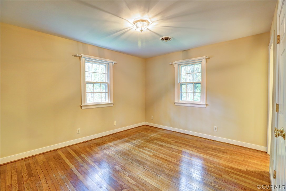 1970 Castlebridge Road Midlothian, VA 23113 - Photo 18 of 28 a view of empty room with wooden floor and fan