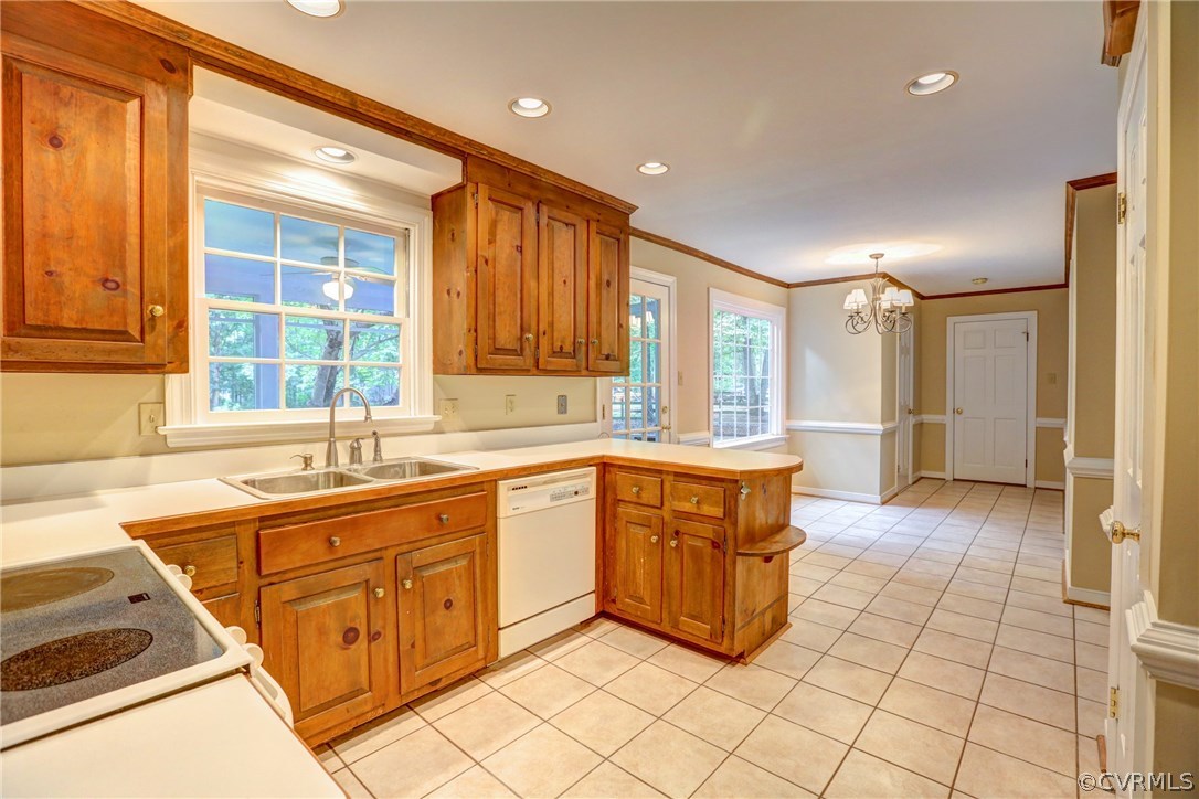 1970 Castlebridge Road Midlothian, VA 23113 - Photo 8 of 28 a large kitchen with stainless steel appliances granite countertop a sink and cabinets