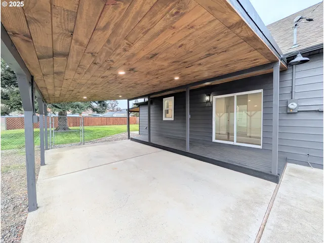 a view of a porch with a backyard