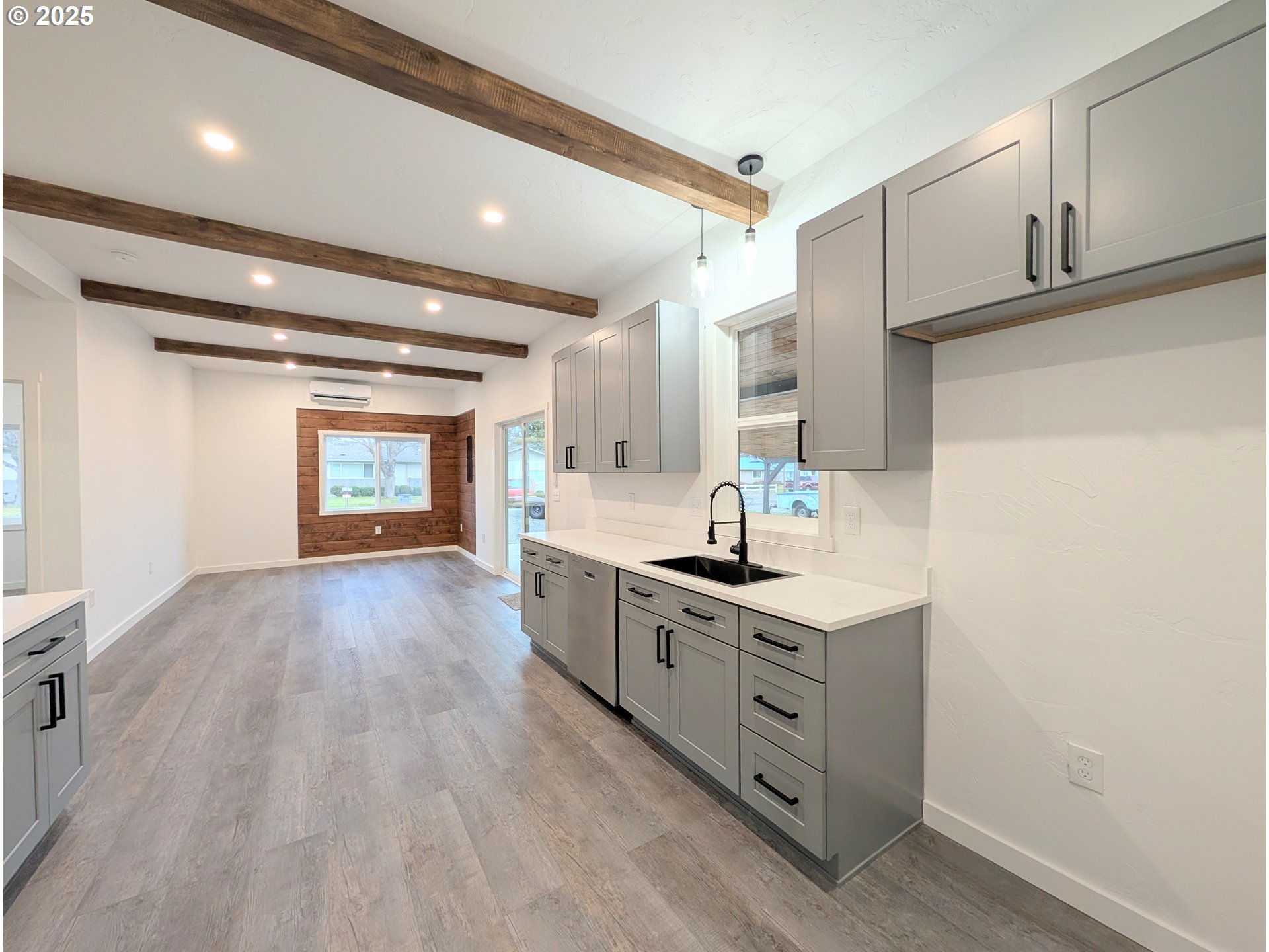 2906 North Oak Street La Grande, OR 97850 - Photo 8 of 37 a kitchen with stainless steel appliances granite countertop a stove and a sink