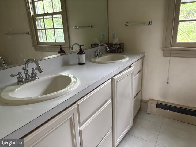410 Wharf Road, Unit RIVER Bensalem, PA 19020 - Photo 20 of 62 a bathroom with a sink and a window